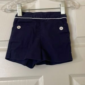 Janie and Jack navy baby shirt with white buttons and pockets.